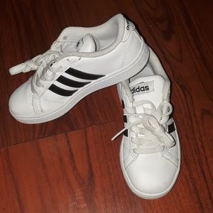 Black and white Adidas.  Size11k